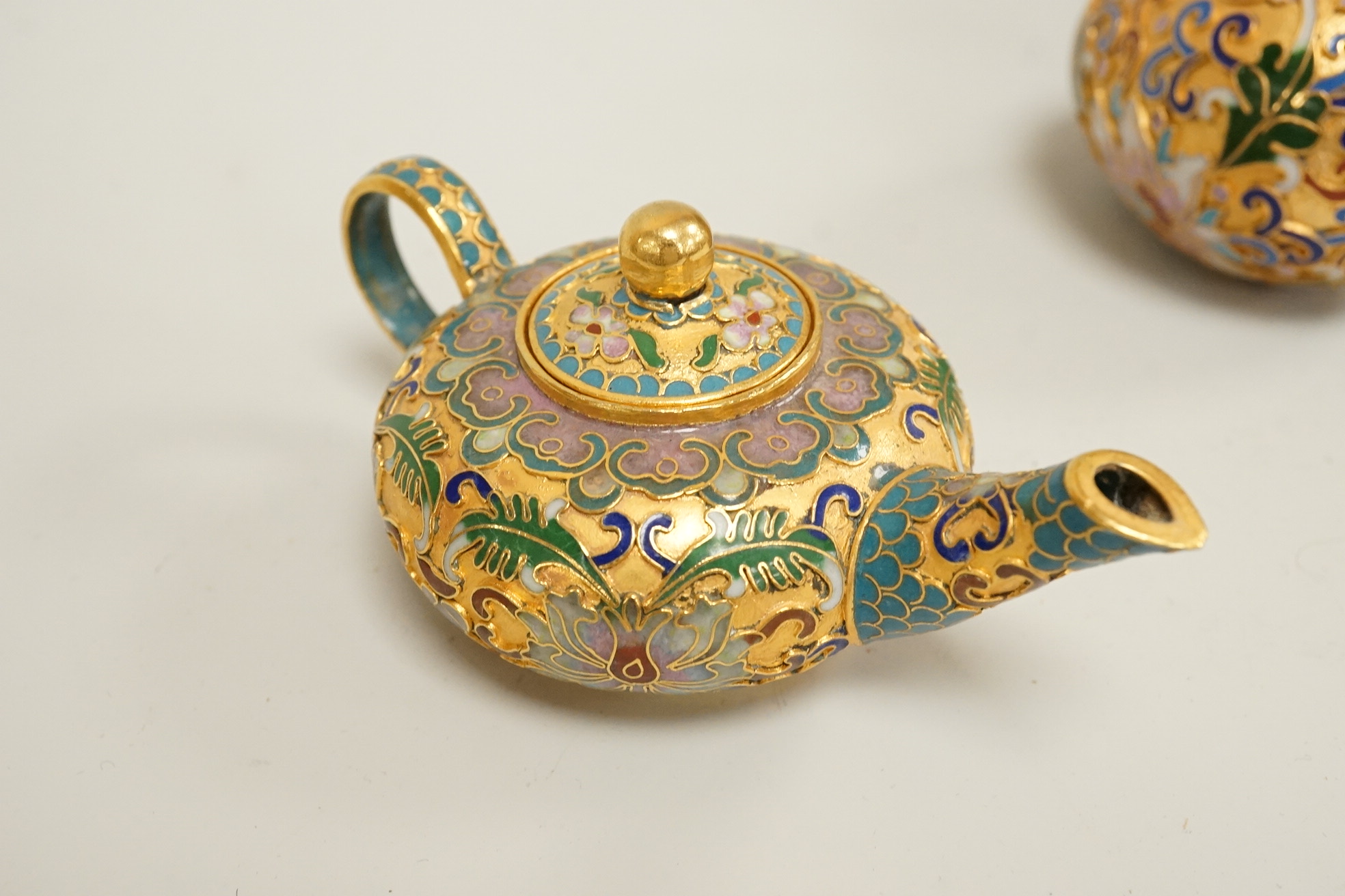 A collection of miniature enamel and cloisonné boxes, eggs and a painted rabbit, etc. (11)